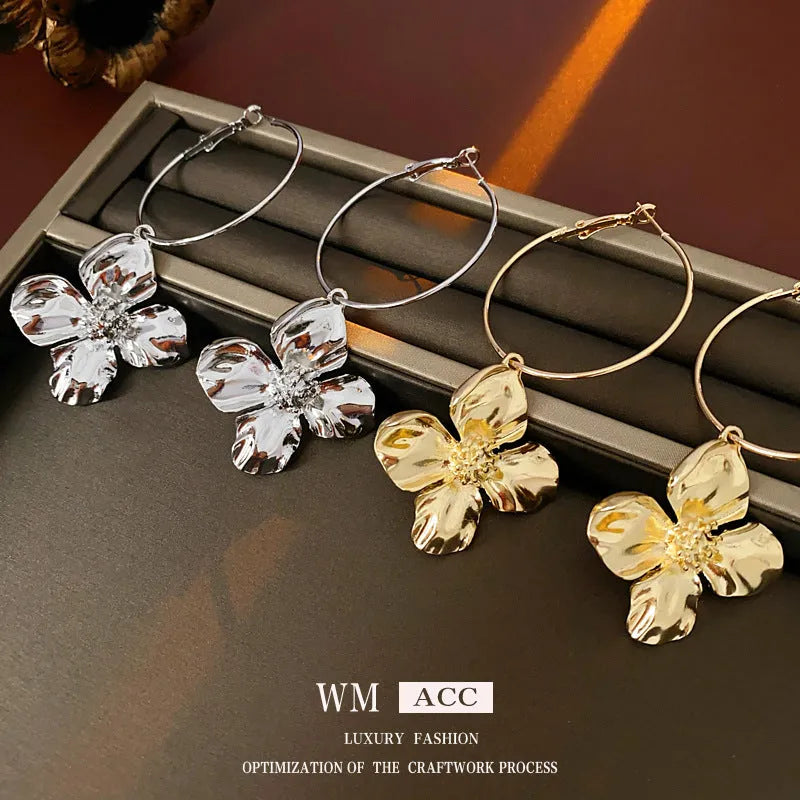 Silver needle metal flower earrings with geometric design in gold or silver electroplated finish