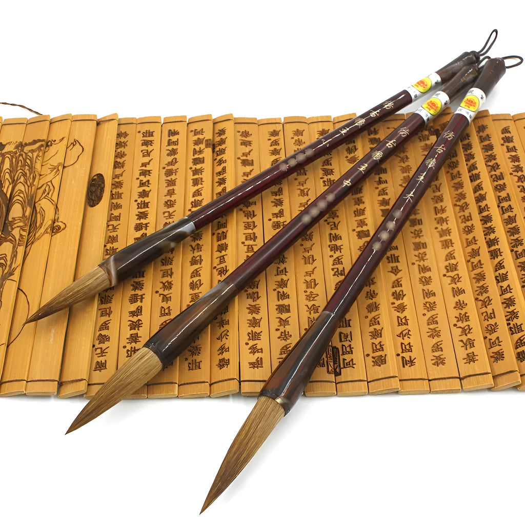 Traditional Chinese wolf hair calligraphy brush with steel rod, styles include large, medium, and trumpet.