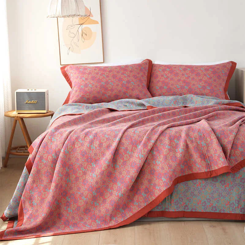 Cotton gauze bed blanket three-piece set with plants and flowers pattern showing blanket and matching pillowcases