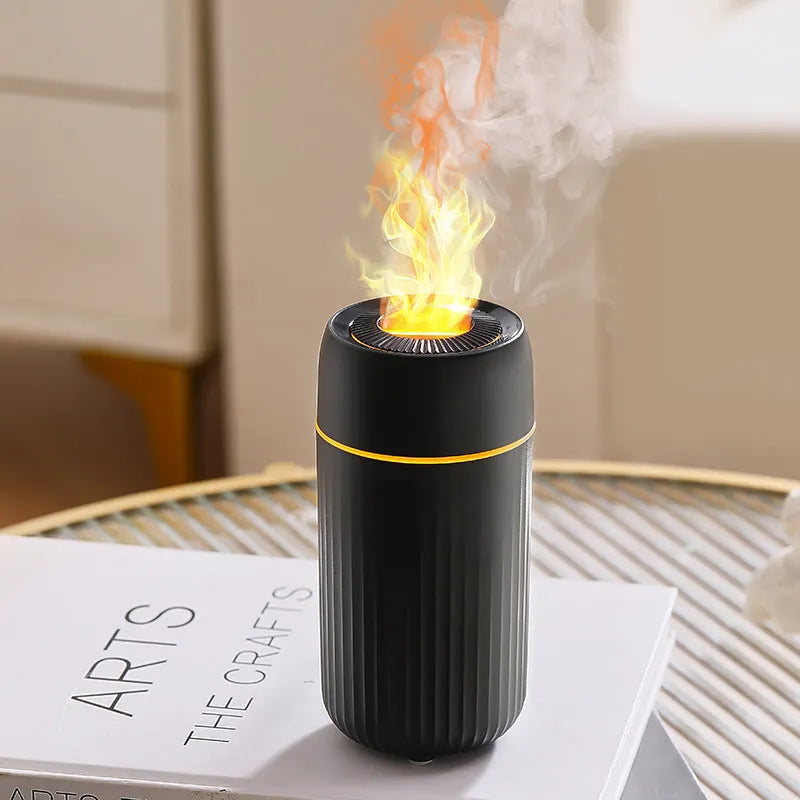 Black car aroma diffuser with LED flame simulation effect on car dashboard