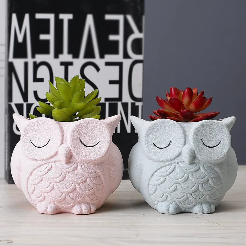 Handmade ceramic owl-design succulent pot in pastel colour measuring 11cm by 9cm by 9cm