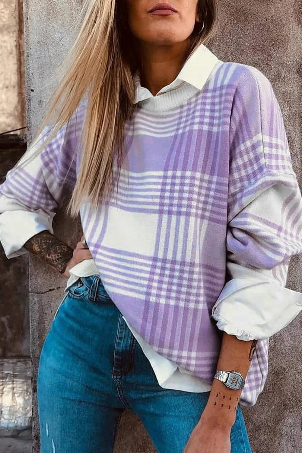 Lilac plaid print loose sweater with ribbed trim on mannequin