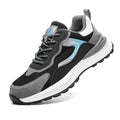 Men's low-top lace-up work safety shoes with suede and mesh upper, steel toe cap, and textured PU outsole.