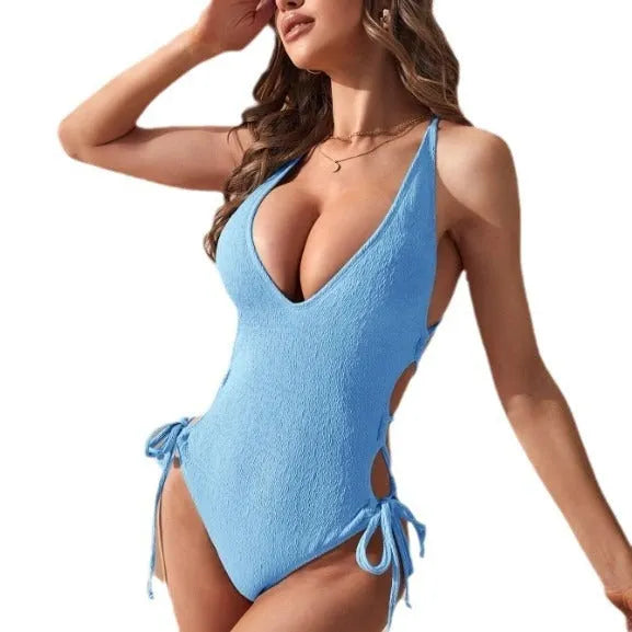 Women's solid-colour hollow backless one-piece swimsuit in Polyester fabric.