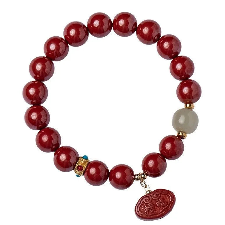 Natural cinnabar bracelet with emperor sandstone Ping An Fu Lu design, shown in 8mm and 10mm bead size options.