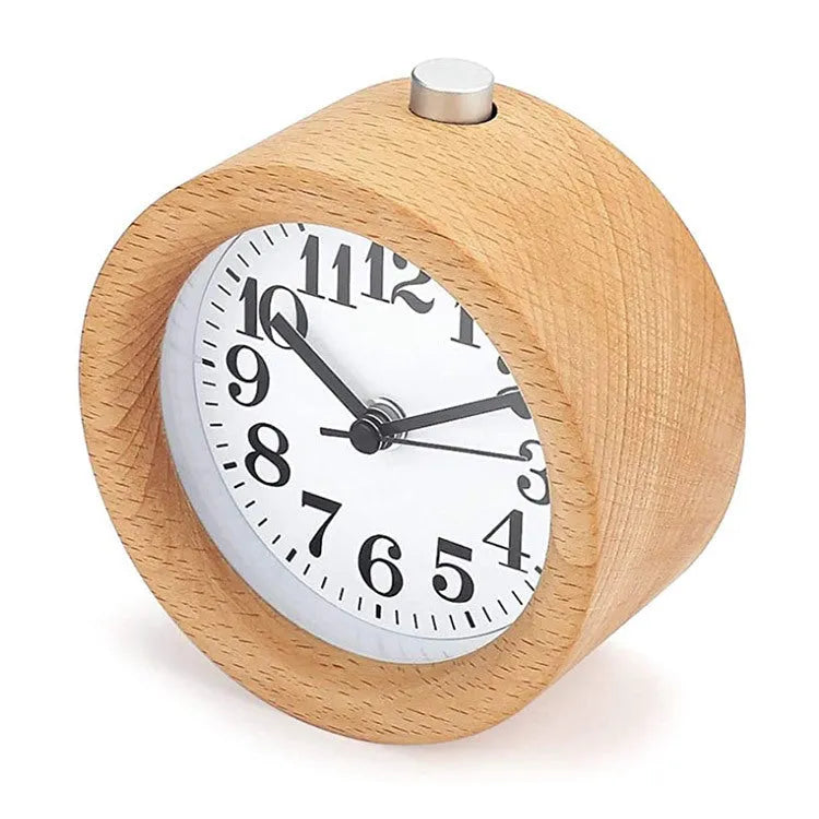 Solid beech wood silent snooze alarm clock showing wooden case, glass mirror face, and 9.5cm diameter