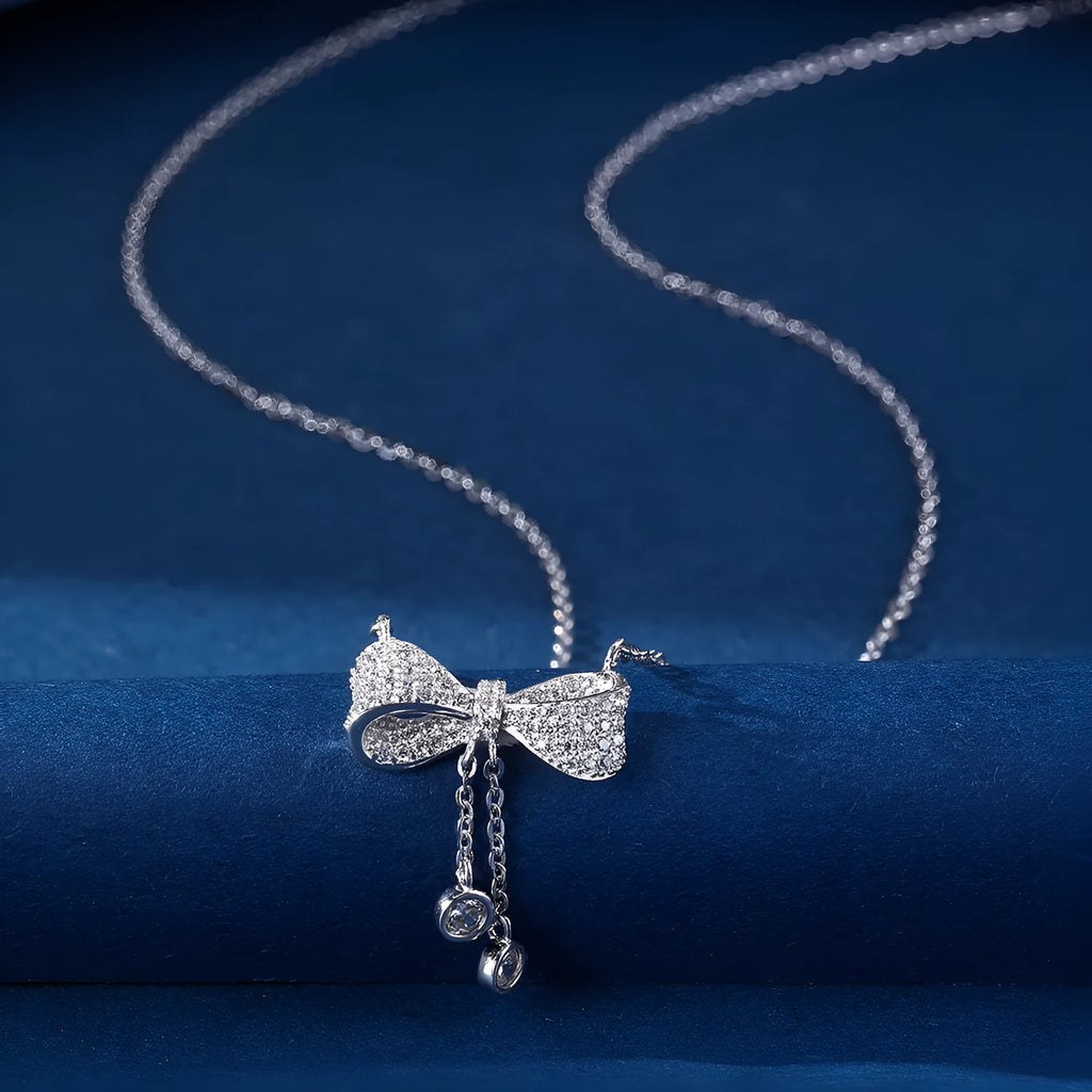 S925 sterling silver necklace with bow pendant on adjustable 40-45cm O-ring chain