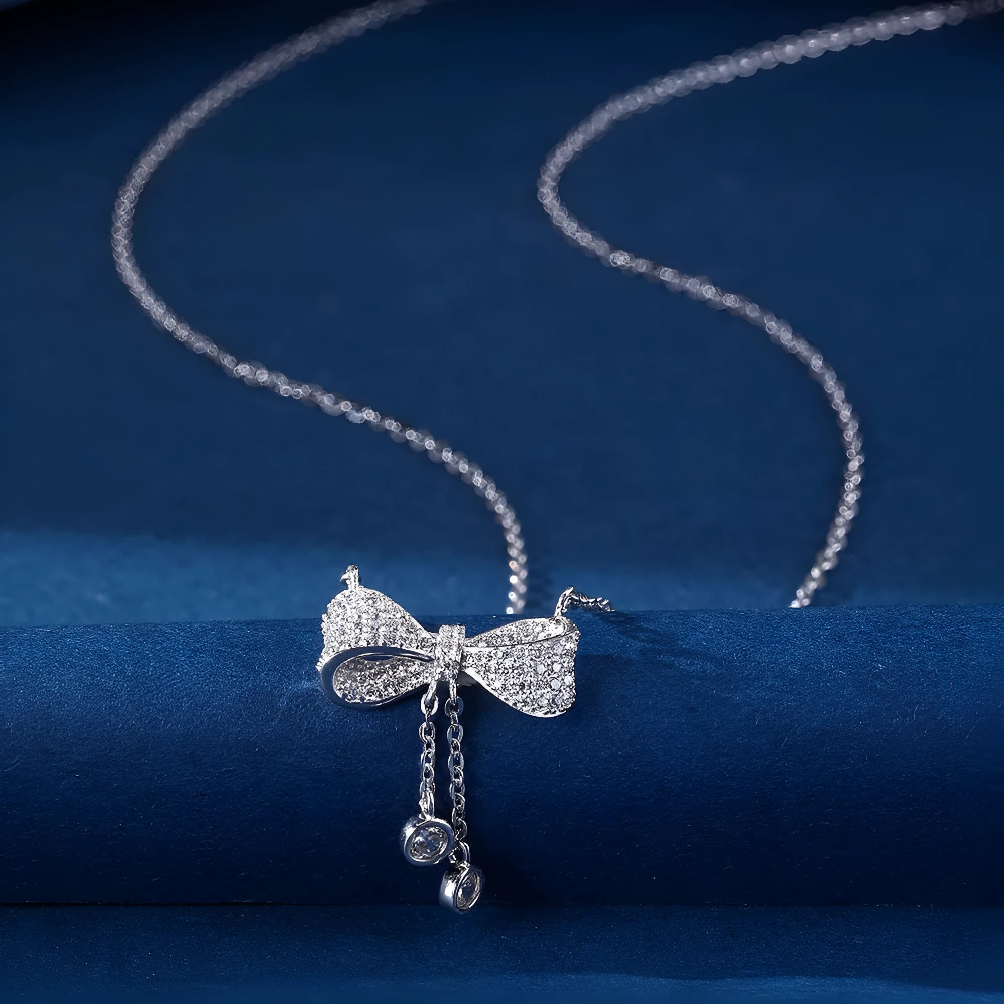 S925 sterling silver necklace with bow pendant on adjustable 40-45cm O-ring chain