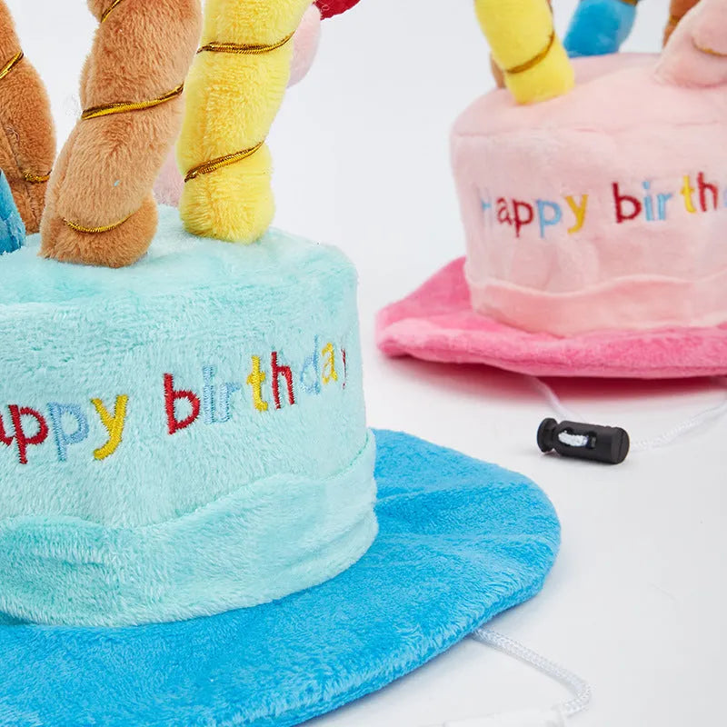 Blue and pink dog birthday hat shown with dimensions 21cm long by 15cm wide