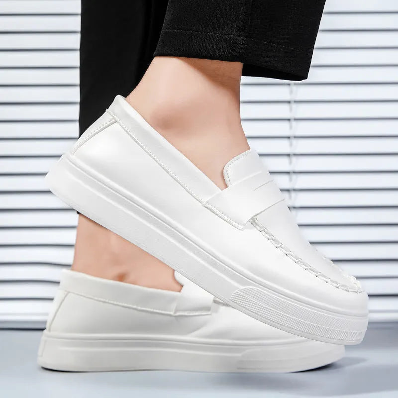 Men's casual slip-on loafers in PU leather with round toe, shown in black and white colour