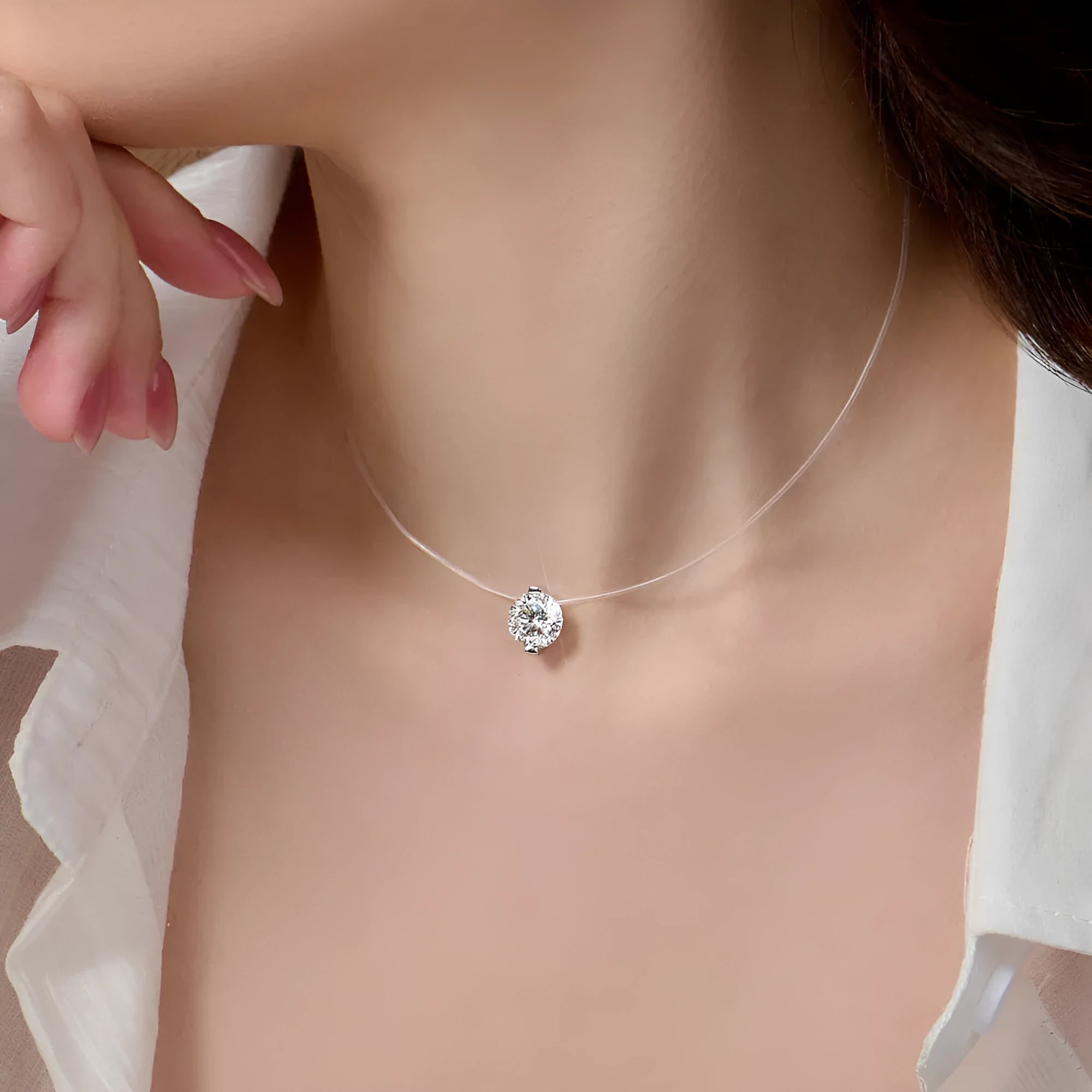 Women's silver moissanite necklace with plum blossom pendant on invisible fishing line chain