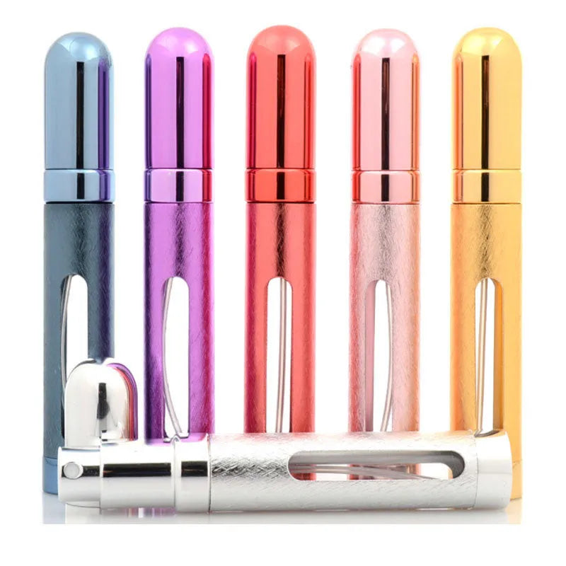 Slim 12ml aluminium travel perfume bottle with glass liner in choice of six colours including blue, gold, and pink.