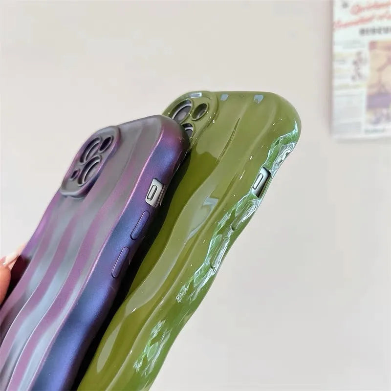 Silicone iPhone 17 case with water ripple texture in green, showing form-fitting design and protective edges.