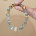 Emerald green Tian Shan Cui jade half bracelet with round beads and traditional national style design