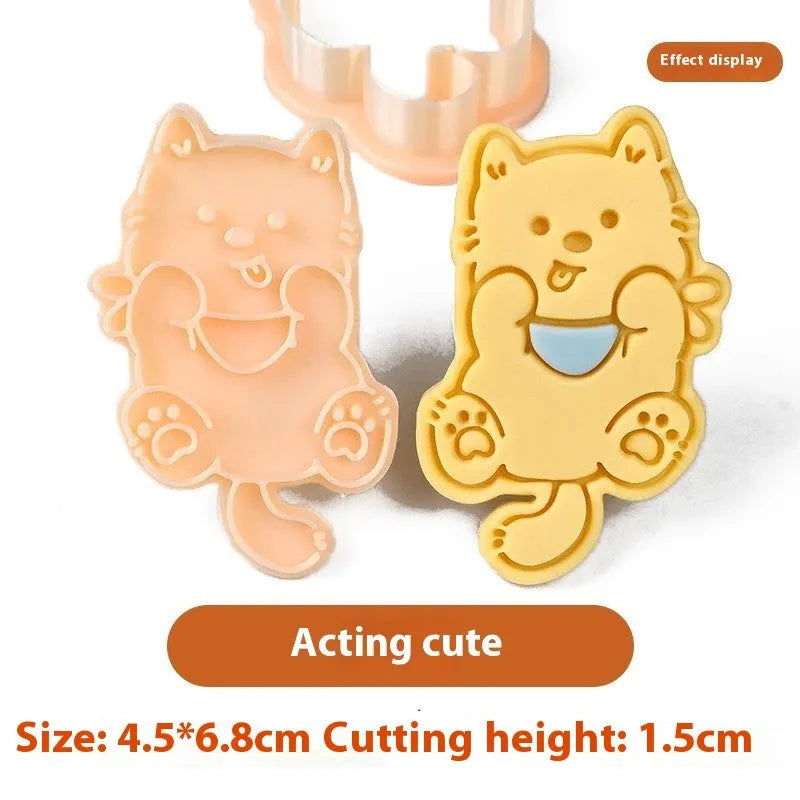 Plastic 3D biscuit mould with cartoon puppy designs including birthday hats and swimming rings