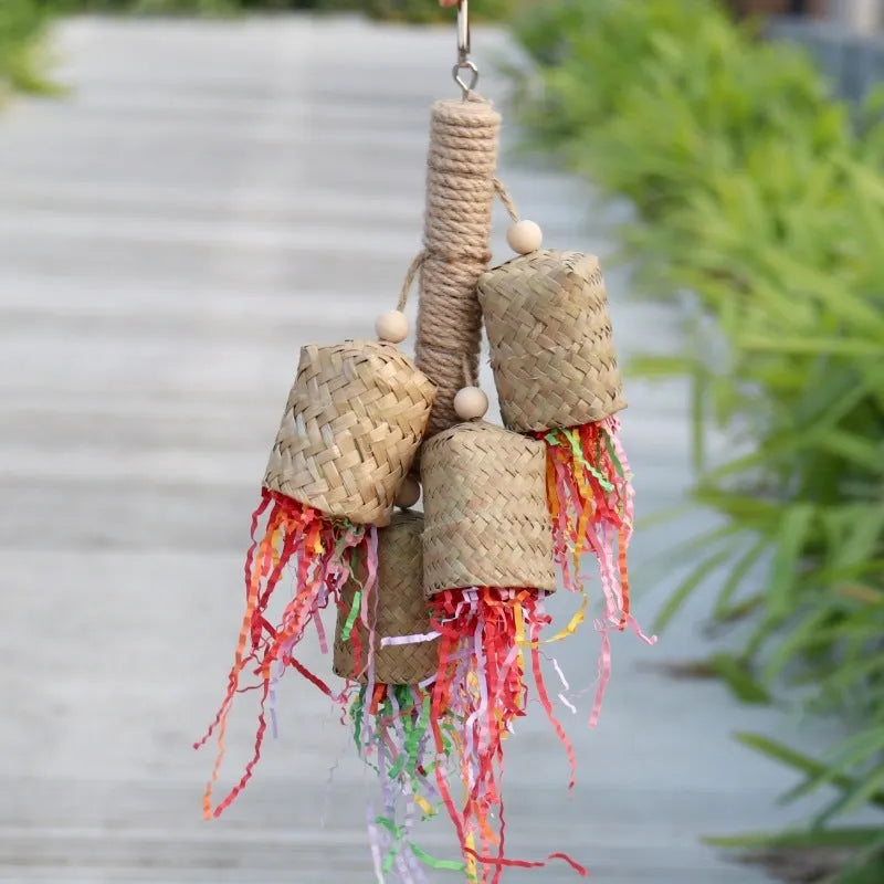 Wood and sisal rope shredded paper bird toy for parrots measuring 15cm by 35cm