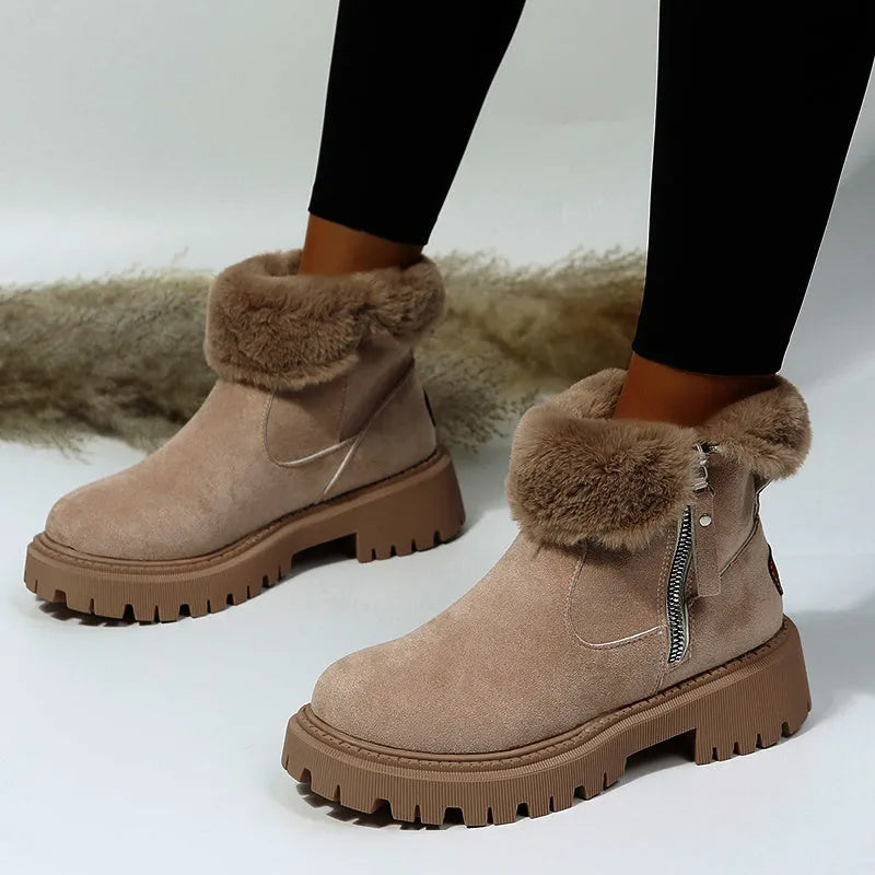 Women's black high-top plush snow boots with a side zipper and thick rubber sole