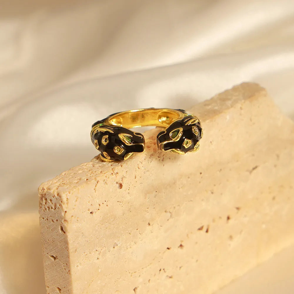 Copper geometric open ring with black cheetah electroplated pattern, size 7