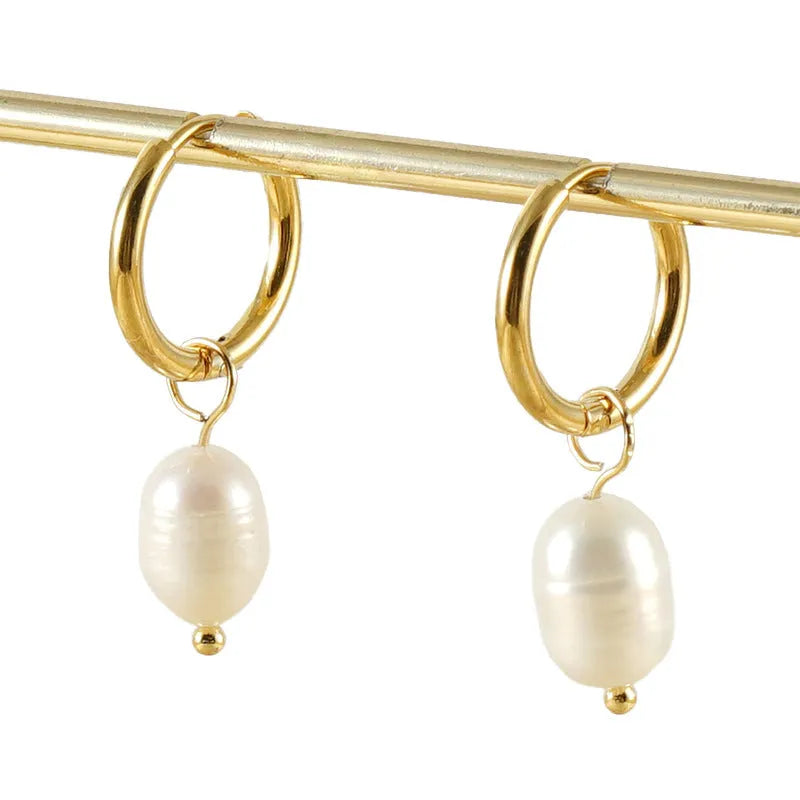 Geometric gold earrings with freshwater pearls on stainless steel posts