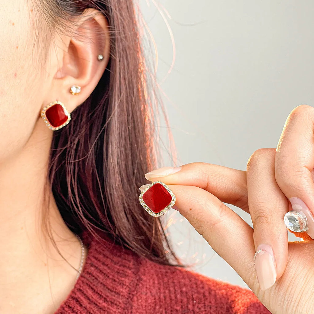 Red square geometric alloy earrings with retro design and stud backing