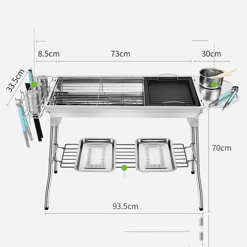 Large stainless steel folding barbecue grill with black cooking grate, shown outdoors.