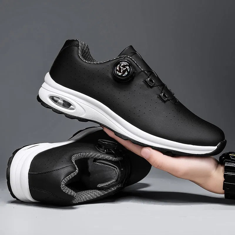 Women's black mesh low-top casual trainers with white cross-straps and a round toe, on a white background.