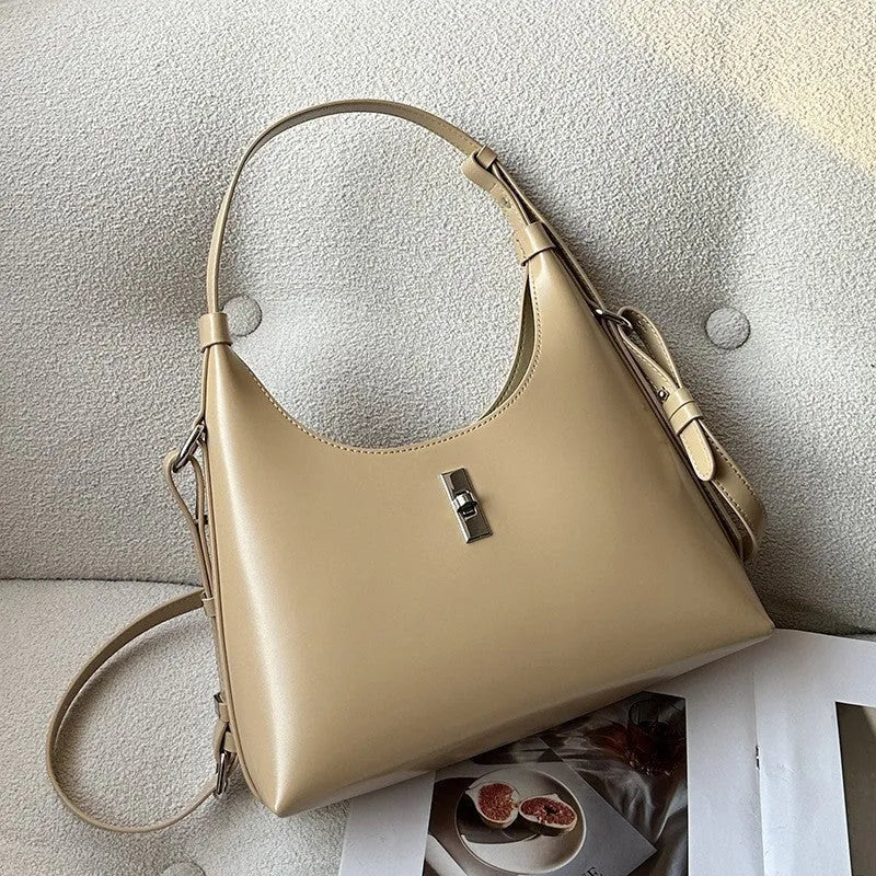 Genuine leather crossbody shoulder bag in dumpling shape with organised compartments