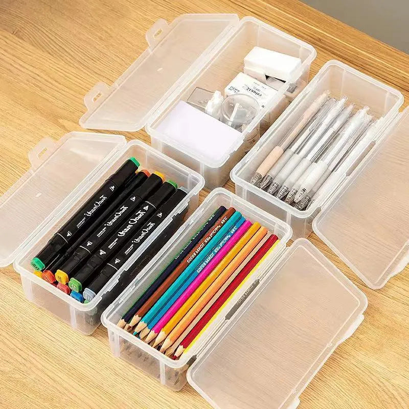 Transparent plastic pencil storage box showing interior capacity for organising drawing supplies