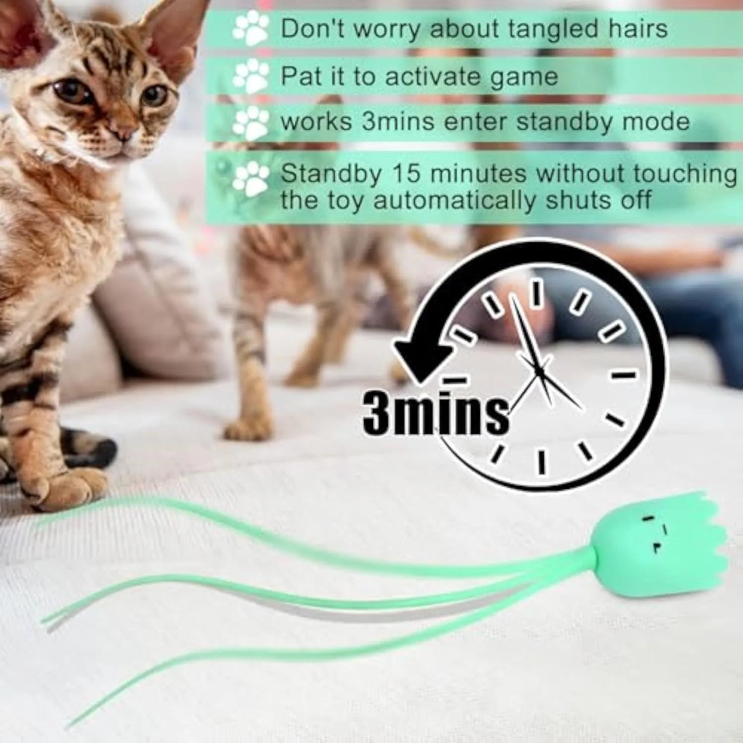 Green automatic cat wand toy with silicone tails swinging, placed on wooden floor