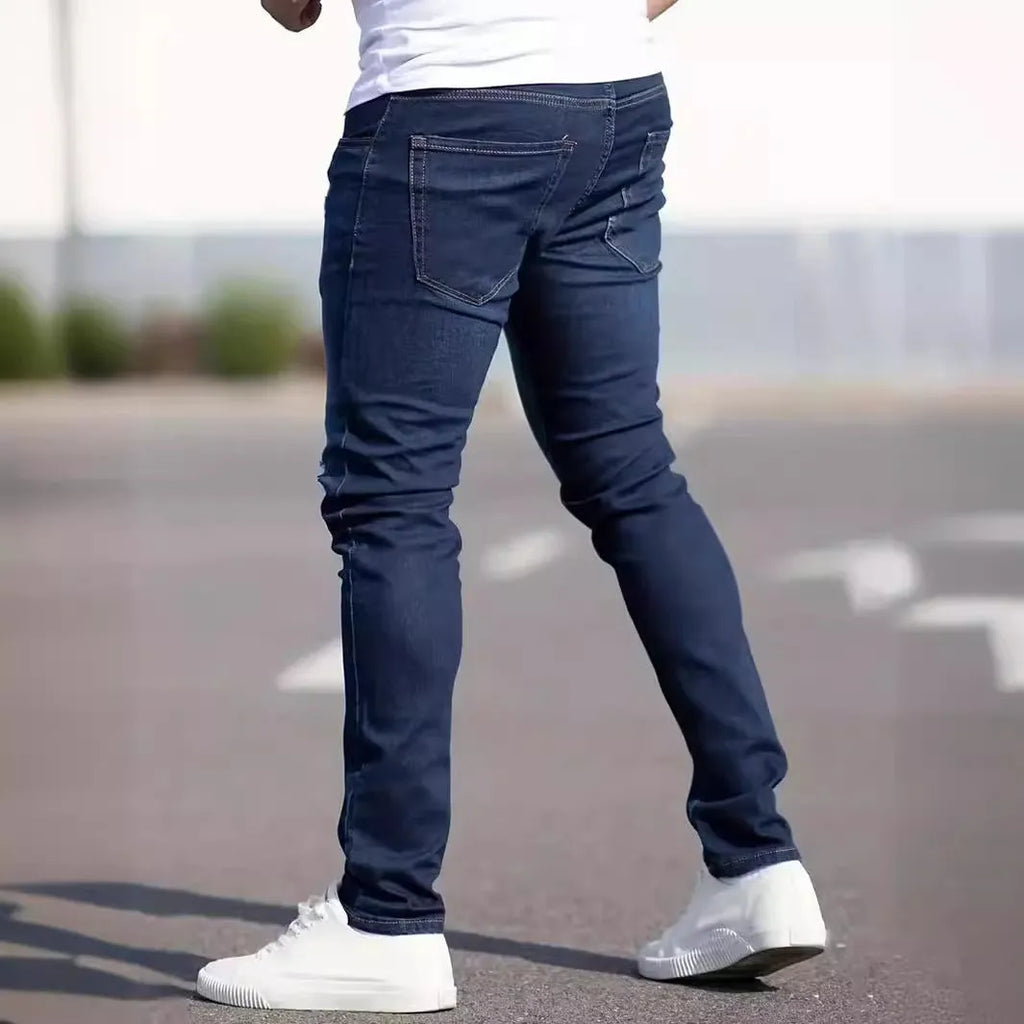 Men's slim-fit dark blue cotton jeans with mid waist and zipper fly