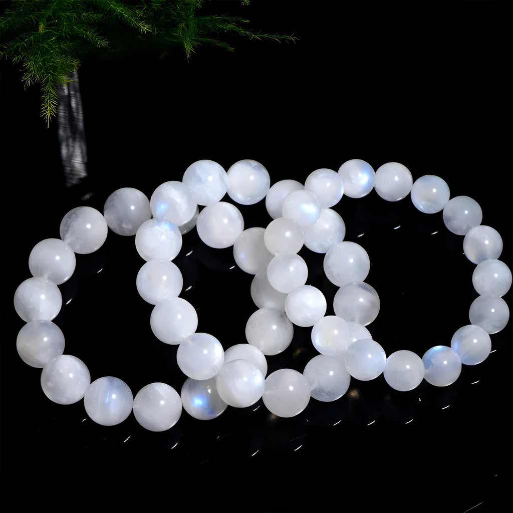 White moonstone bracelet with blue moonlight colouration in round polished beads