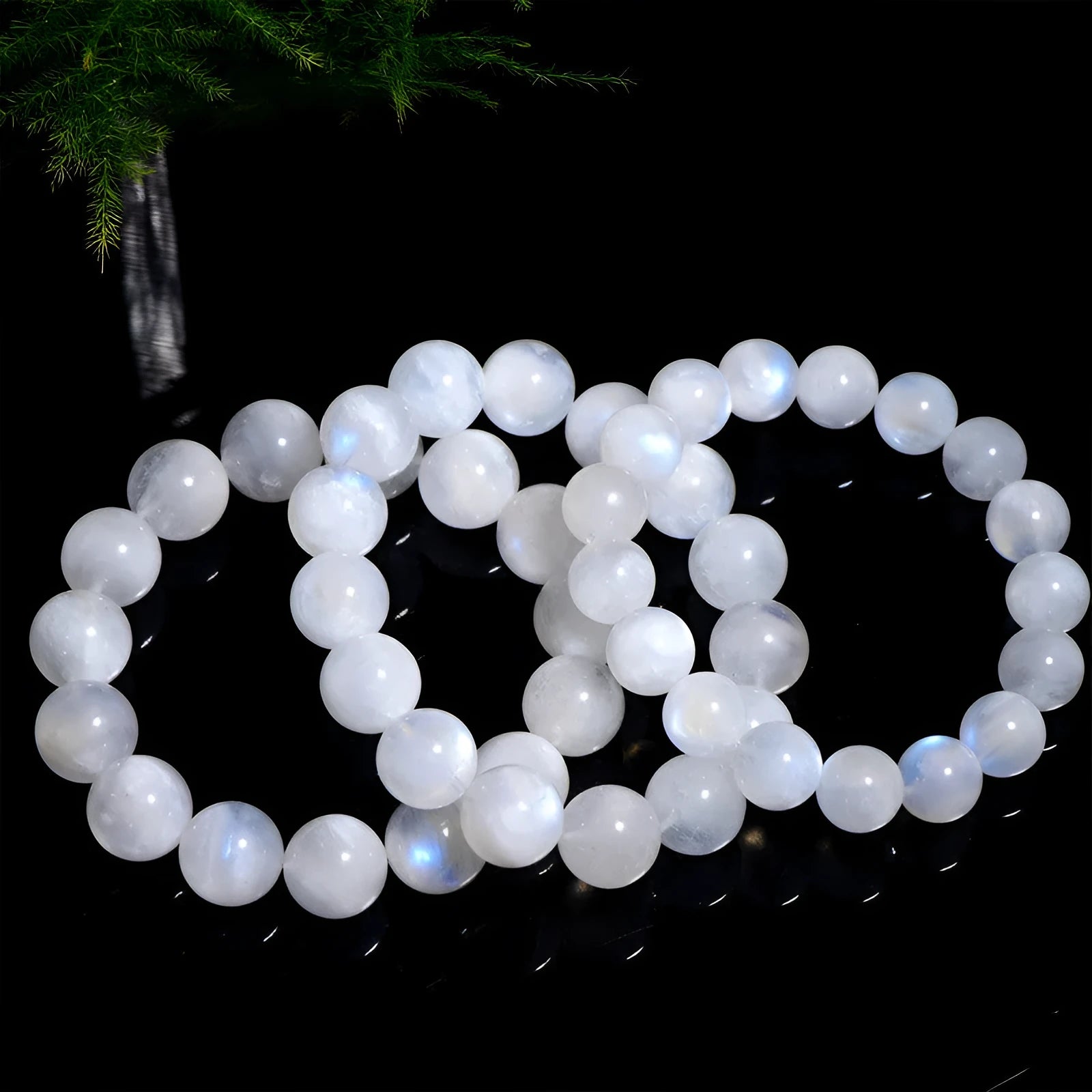 White moonstone bracelet with blue moonlight colouration in round polished beads