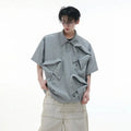 Men's deconstructed polo shirt with multi-collar design and geometric pattern details in polyester fabric
