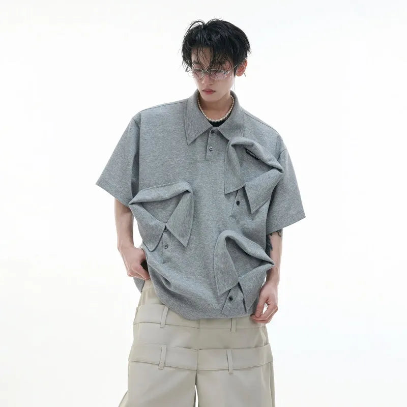 Men's deconstructed polo shirt with multi-collar design and geometric pattern details in polyester fabric