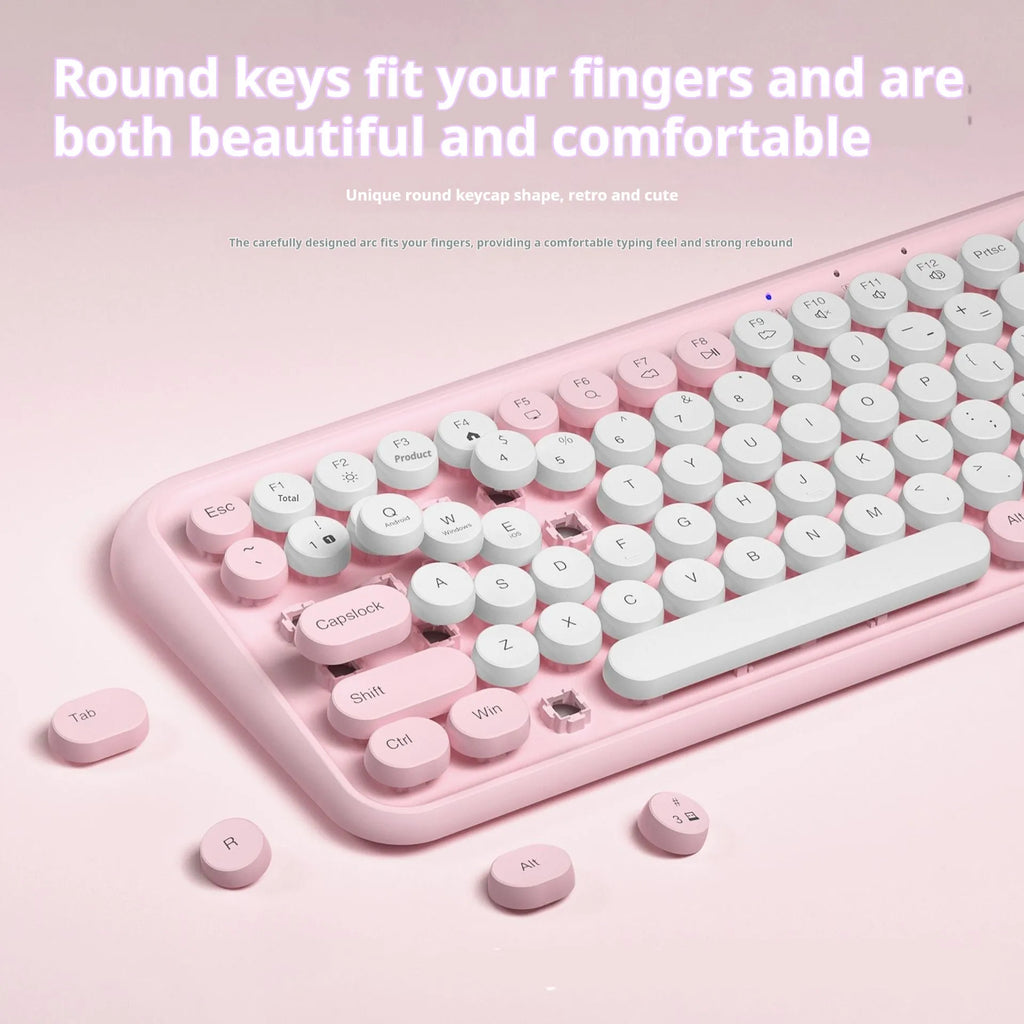 Pink dual-mode Bluetooth portable keyboard with silent keys and compact design