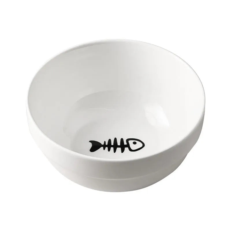 White ceramic cat bowl with decorative iron frame in cat footprints pattern