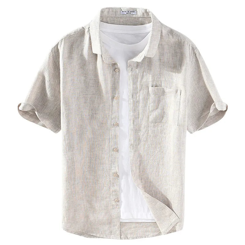 Men's raw jute coloured linen shirt with square collar and short sleeves on a hanger.