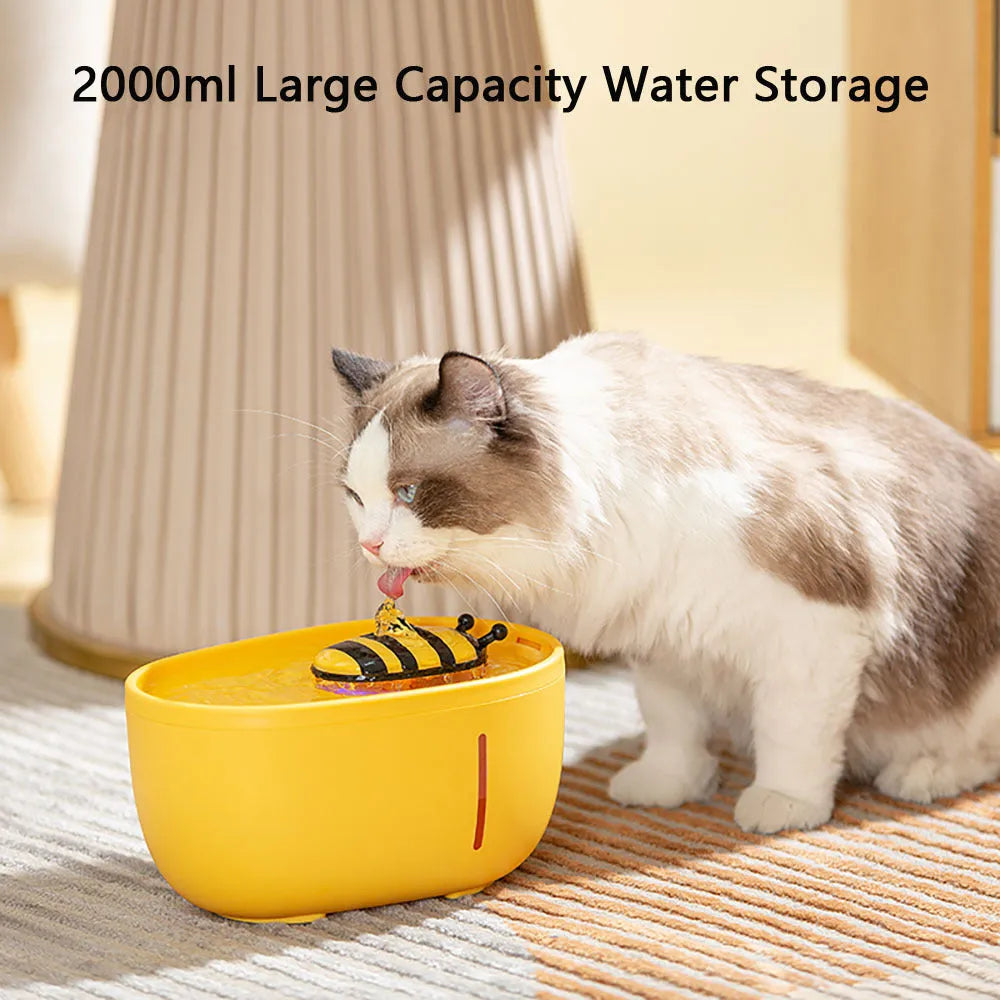 Yellow cat water fountain with filtration system, water level window, and USB connection