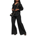 Brown women's suede velvet two-piece suit with long sleeves and full-length trousers on a model.