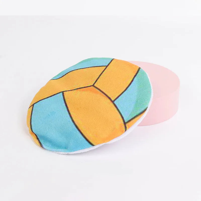 Catnip flying disc toy with plush exterior and sports ball patterning for indoor cats