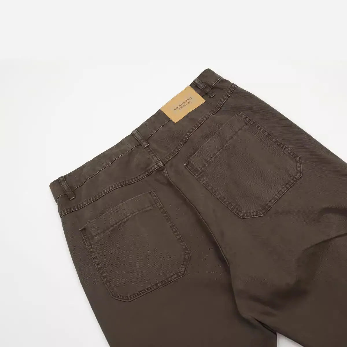 Men's brown loose fit straight leg cotton trousers with high waist design