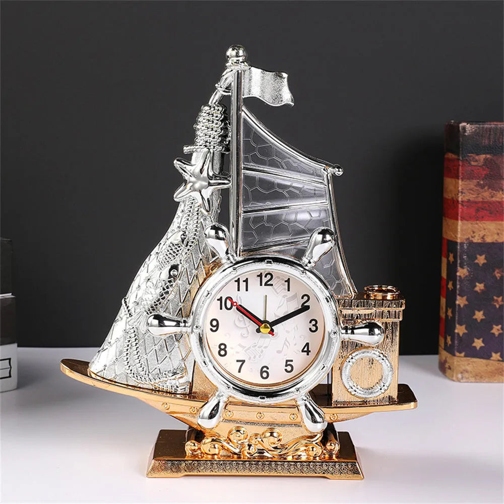 Gold or silver fashionable bedroom alarm clock on a bedside table.