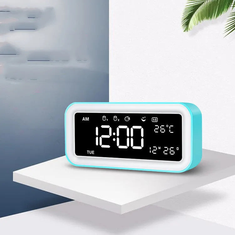 Rectangular multifunctional LED atmosphere light alarm clock with digital display and quartz glass mirror in blue or pink plastic casing