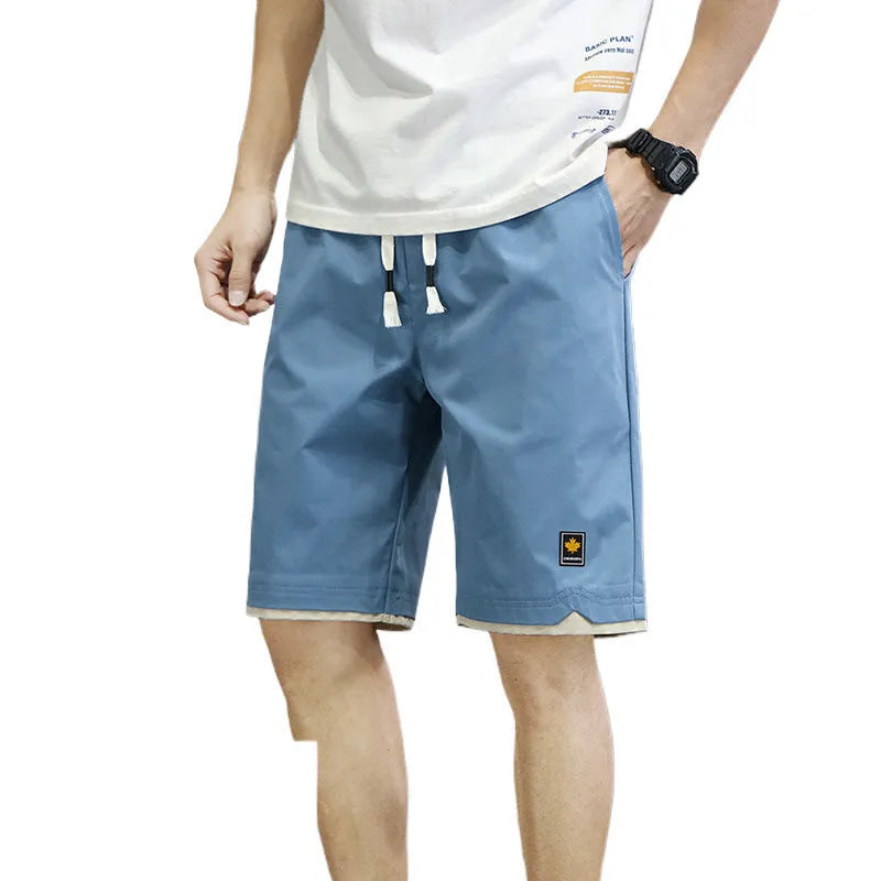 Men's loose fit beach shorts in polyester fabric available in multiple colours and sizes