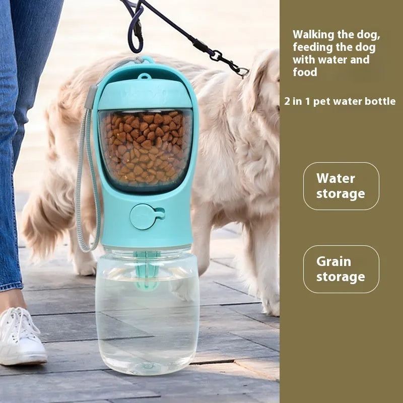 Blue portable plastic dog water bottle with integrated drinking trough for outings.