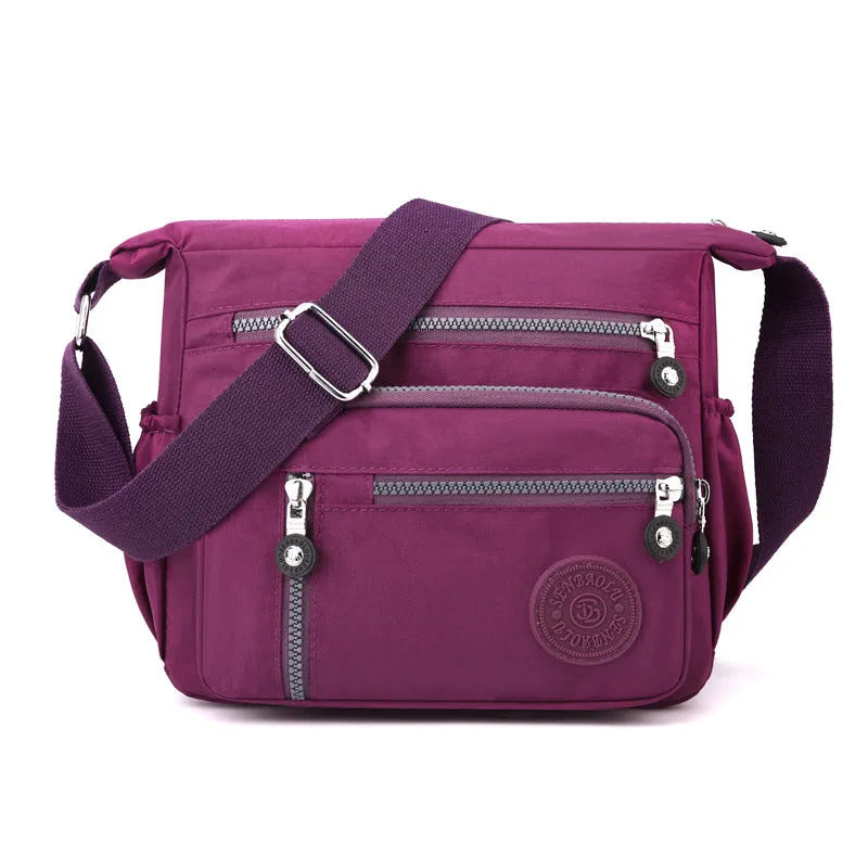 Soft nylon messenger bag with shoulder strap in square vertical shape