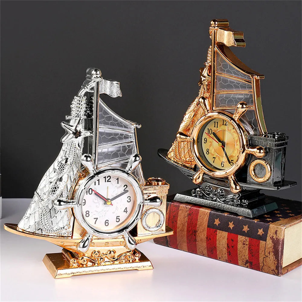 Gold or silver fashionable bedroom alarm clock on a bedside table.