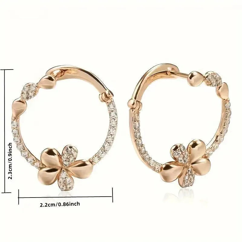 A pair of women's round silver hoop earrings made from electroplated copper.