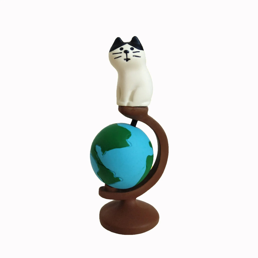 Cartoon cat resin figurine wearing Statue of Liberty crown and holding a globe, Earth Instrument Cat style.