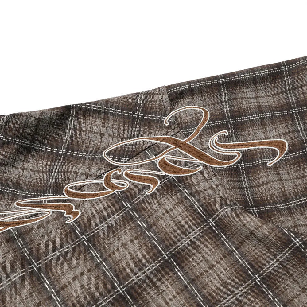 Men's black and brown plaid shirt with embroidered letter detail and lapel collar